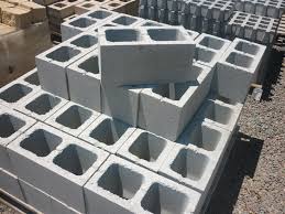 This is how the 200 series block look like on a pallet, they weigh approximately 16.7 Kg each as their description is said to be 60 to the ton.  To build with blocks is very competitive as it is easy to build a big wall compared to bricks.     