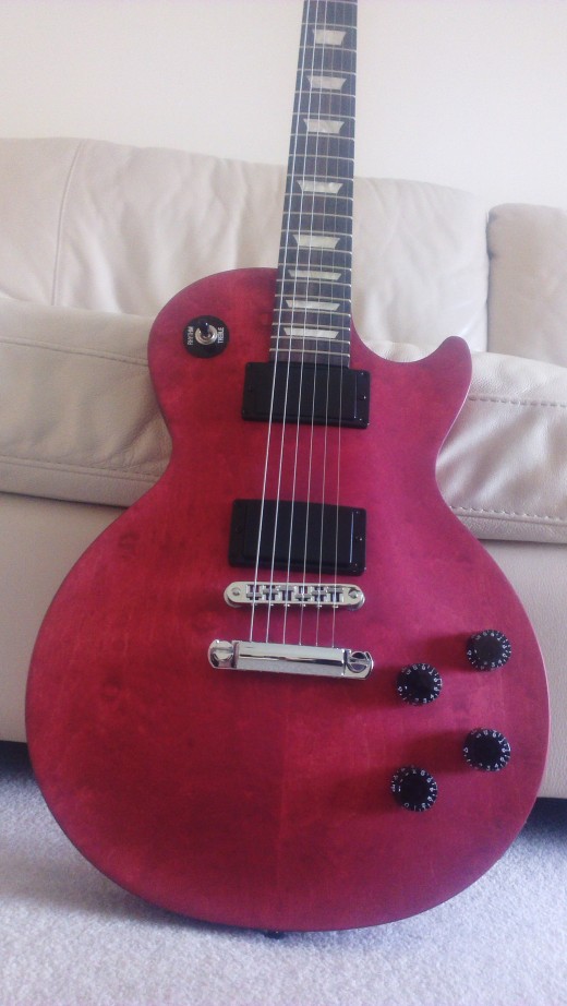 The two black bars on this guitar are the humbucker pickups with the two coils