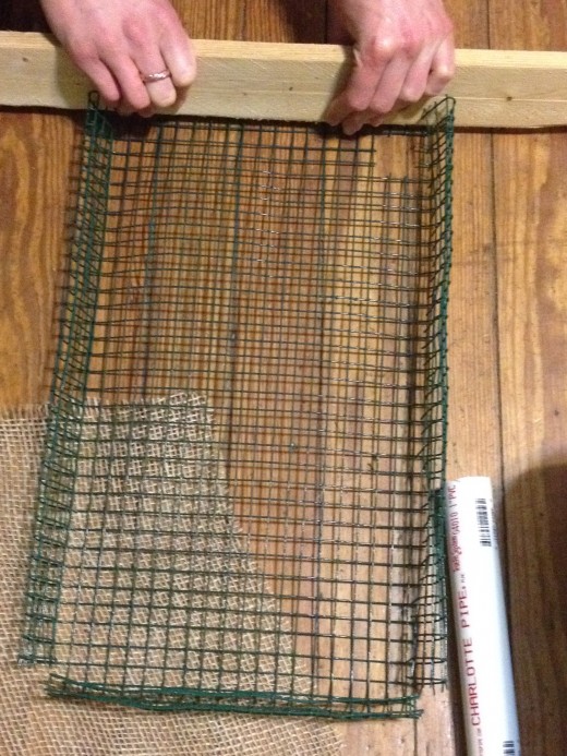 Bend the wire mesh with a wooden board.