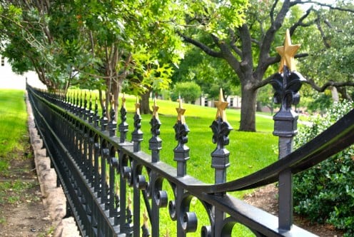 The Texas Star adorns gates at the State Capitol