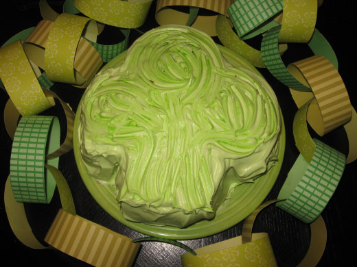 My grandmother's fluffy mint chocolate cake is perfect for St. Patrick's day!  Uses a box mix, frosting, whipped topping, mint extract and food coloring.  It can also be left whole, dyed any color, and enjoyed for any celebration!