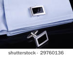 Cufflinks with a shaft ... seems to be the most common.
