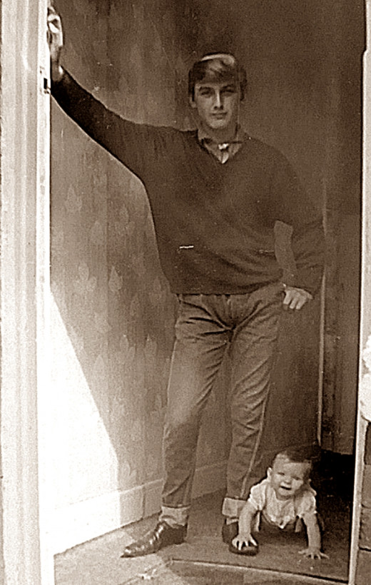 My earliest memory: My big brother posing for a photograph, which I gatecrashed after crawling speedily down the hall.