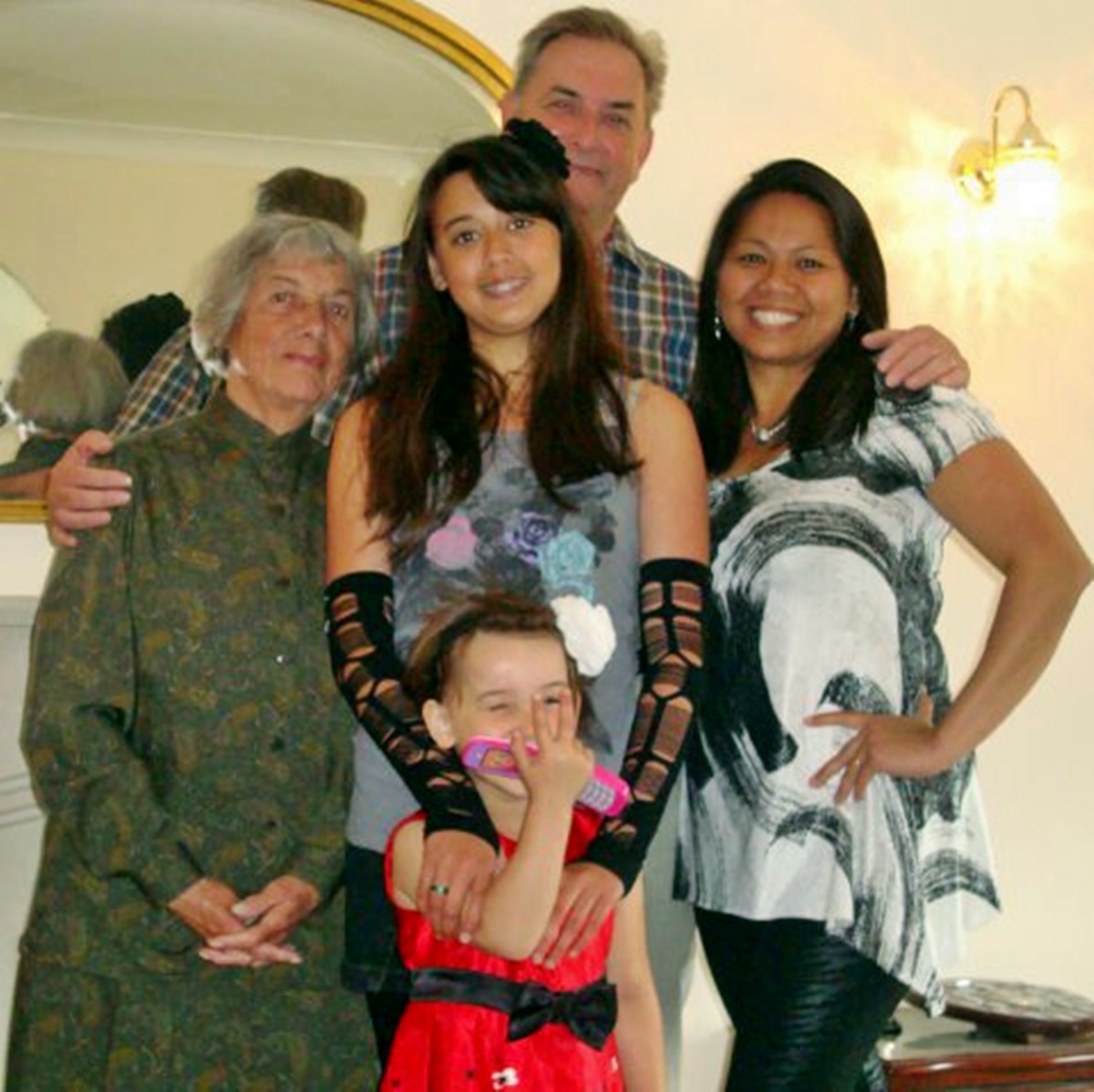 My brother with my sister-in-law Liza, my nieces Becky and Sarah and our mum.