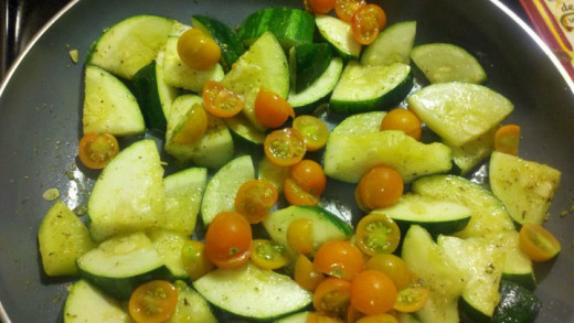 Sun Gold Tomatoes sautéed with Zucchini and herbs.