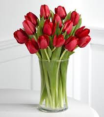 Nothing fancy, even a few tulips in a vase will maker her smile!