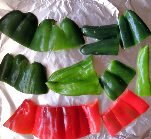 halve peppers, seed, lay flat on foil, and broil