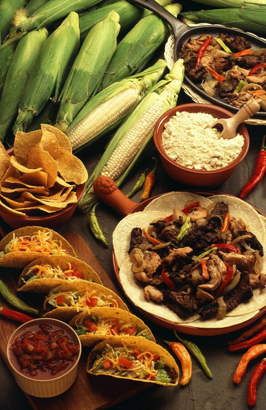 Typical Southwestern cuisine including tacos, corn, fajitas, salsa, cornmeal, chiles, and tortilla chips.