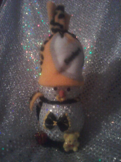 Handmade one of a kind Snowman  made by Gardener Den.  This a great little handmade snowmade You can buy them from Gardener Den. Or make your own steeler snowman.
