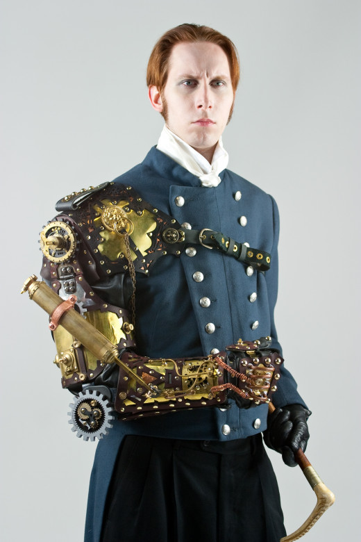 Steampunk image of author, G. D. Falksen, in an arm mechanism created by Thomas Willeford.