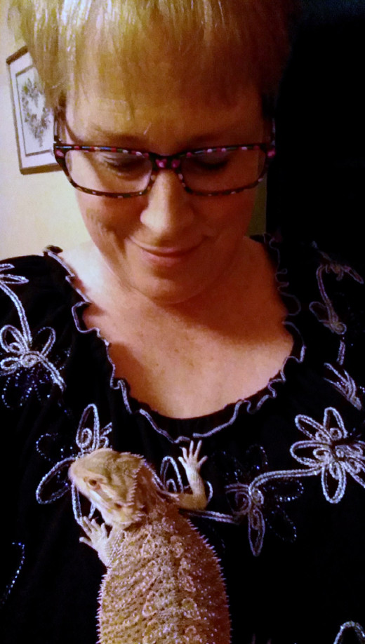 To think that she was only the size of my thumb when I got her!  She loves hanging on me and walking around the house!