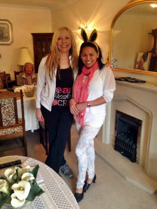 Me with Liza at our Easter meal in 2013 (with mum in the background, dining). I had started wearing stretch trousers and leggings to accommodate my weight gain.