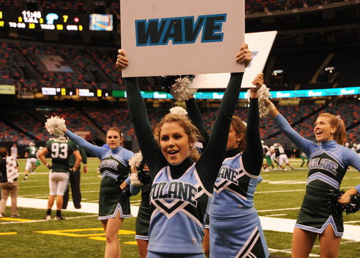 Cheerleaders Interact with Crowd