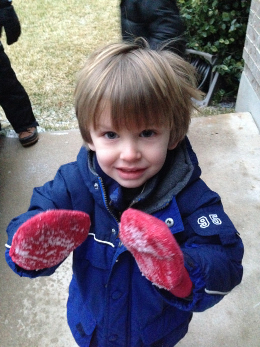 The novelty of snow in Austin!  It soon wears off in favor of the warmth of the living room.