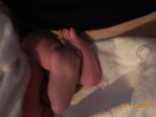 Toes of my 2nd boy. He wrapped one foot around the other leg. 