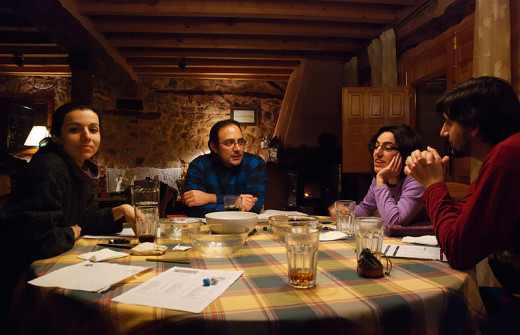 A group of role playing gamers, enjoying a night session. Dice, snacks, beverages, character sheets [This photo was taken and published with the consent of all four identifiable subjects] by Diacritica