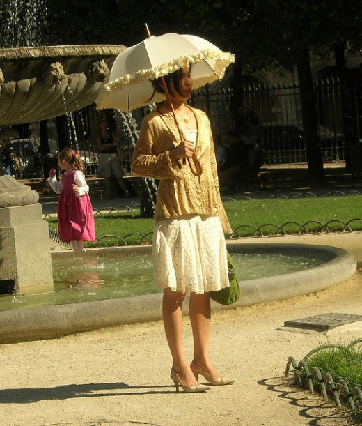 Keep umbrella with you to protect your skin and hair from sun