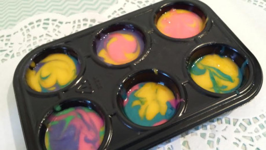 You can take a toothpick and swirl around the colors before putting it in oven.