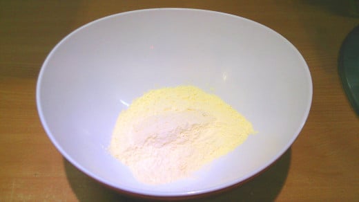 Add 1 cup of yellow cornmeal to a bowl