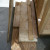 Build up a platform on which to prop up siding. A short crowbar was used to pry the siding into position before a screw was driven home on each side. Build up a platform on which to prop up siding. A short crowbar was used to pry the siding into position before a screw was driven home on each side.
