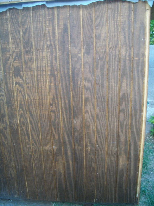 Siding installed.  Notice the corner stud is partly exposed.  This will be covered by trim later.