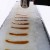 Maple taffy is one of the many delights associated with boiling down maple sap.