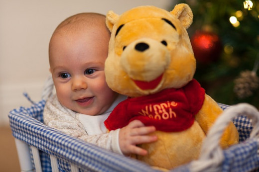 Creating a scrapbook for your baby's firsts - such as first Christmas is a wonderful way to remember their first year. Image is Public Domain from Pixabay