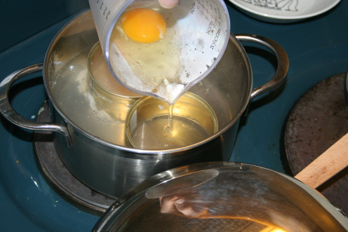 Poach eggs directly in boiling water or in egg poachers