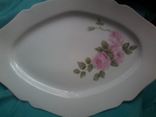 Hand painted pink roses on a white porcelain platter. Simple, beautiful and useable.
