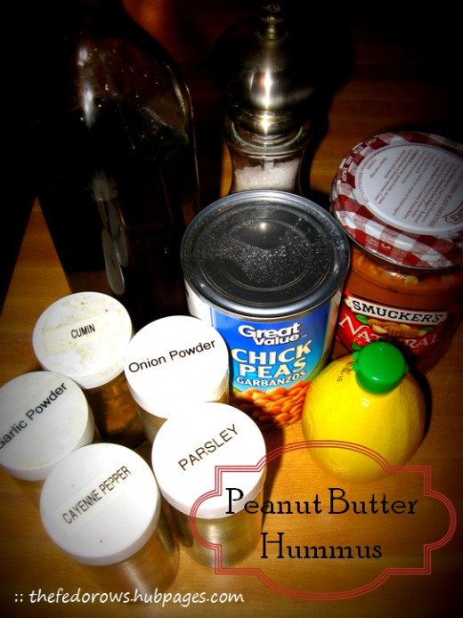 You'll need these five peanut butter hummus essentials: chickpeas, olive oil, salt, peanut butter and lemon juice.  If desired, you'll need these five delicious extras: garlic, onion, cumin, parsley, and cayenne. 
