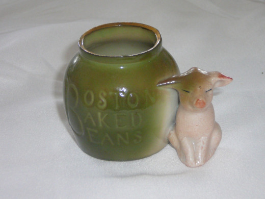 Boston Baked Beans. These are fairly common and come with a green or orange pot.  Featured in "This little Piggy" its 1992 value was Paid $70. 3" x 2 1/4".Paid  $35. Common