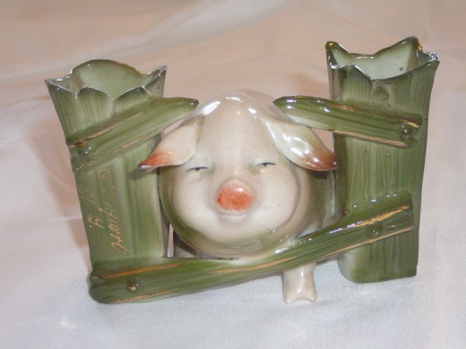 This little guy is trying to get away. Featured in "This little Piggy" its '92 price was $180. 4" x 2 1/2". Paid $42. Common.