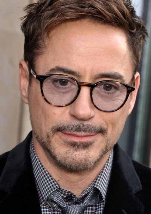 Robert Downey Jr (2013)- Looking pleased. Probably due to the sum of money he is currently earning. 
