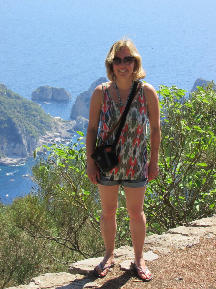 At the top of Mount Solaro with the Faraglioni Rocks in the background - you won't get higher than this on Capri!