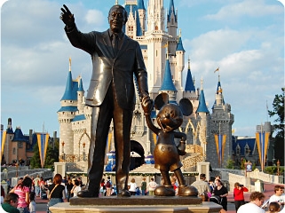 Walt Disney and Mickey Mouse immortalized in front of Cinderella's Castle in Magic Kingdom.