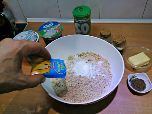 Add some baking powder, ginger powder and cardamom.