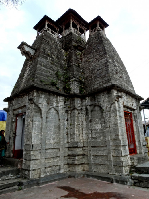 Shiva temple; three of the five turrets with wooden roof over the Amlok Shila-s are visible