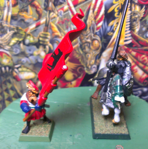 A General and Captain of the Empire.  Notice the battle standard the Captain is bearing.
