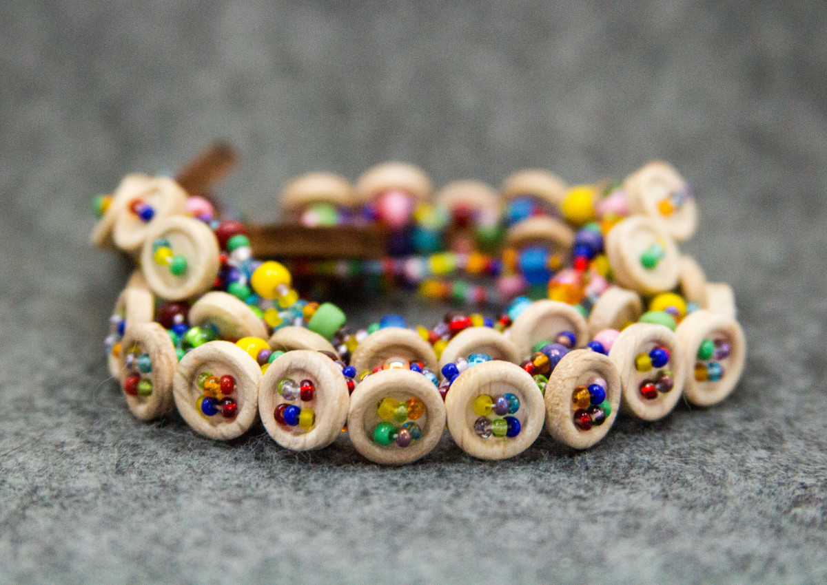 The wooden buttons keep these bracelets from getting overwhelming or too busy.