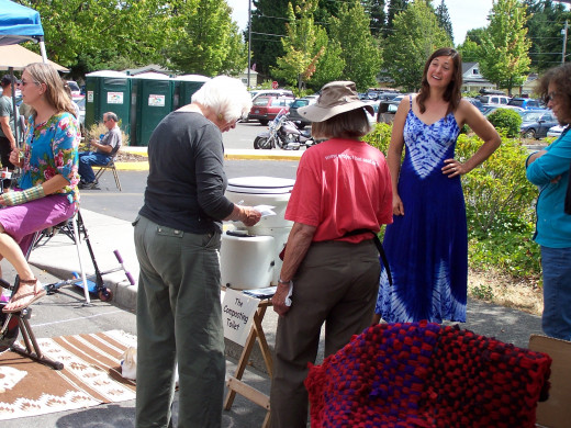 Describe the lady in blue in two sentences
