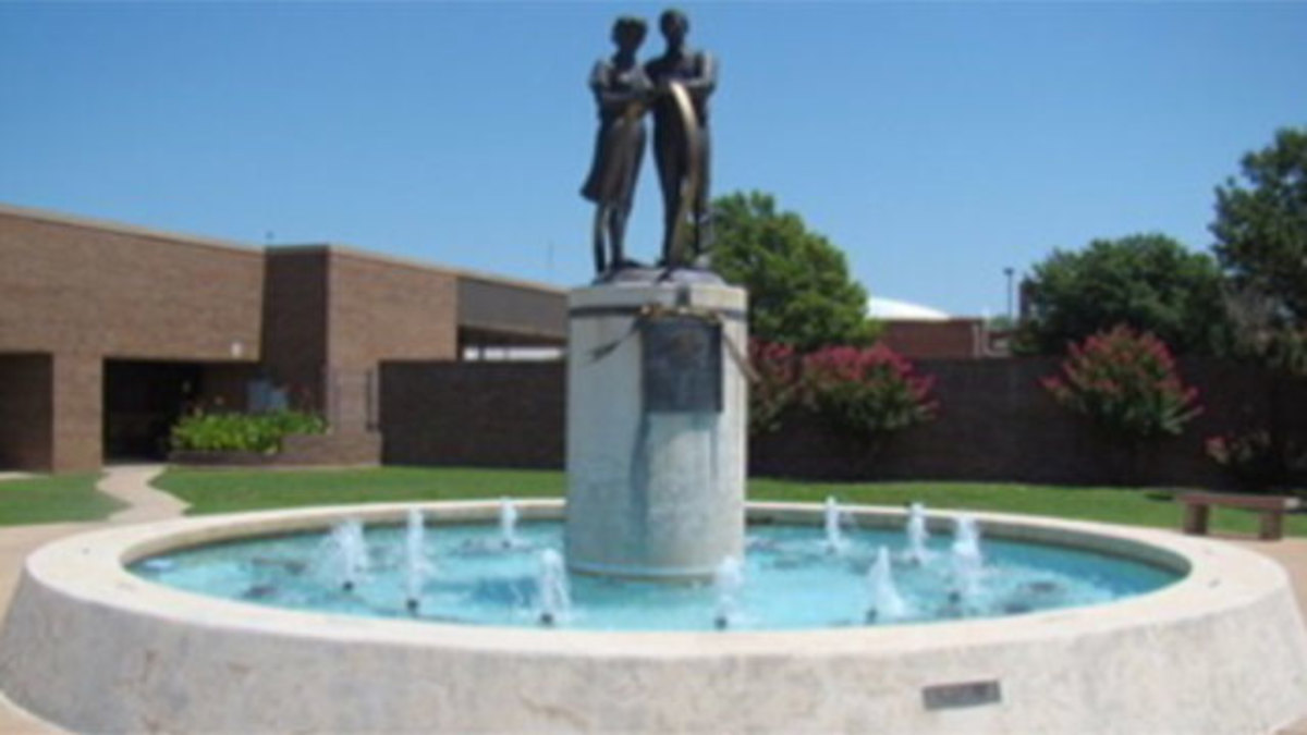 This fountain and statue stand as a memorial for the victims of the 1986 postal killing spree in Edmond, Oklahoma.