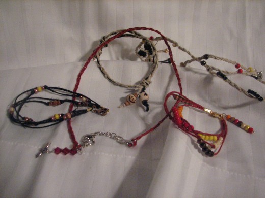 beads strung on colorful hemp thread, are sure to produce sturdy necklaces, bracelets and ankle adornments