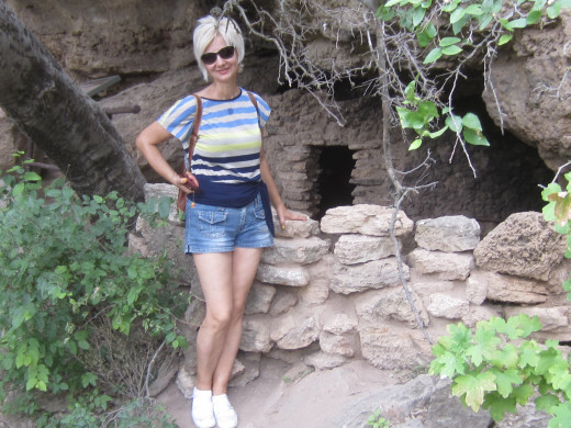 My wife next to Sinagua structure at nearby Montezuma Well
