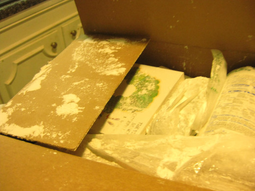 Everything in the shipping box was covered with powder from an open container.
