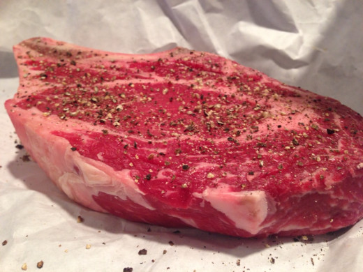 Raw Dry-Aged rib eye steak