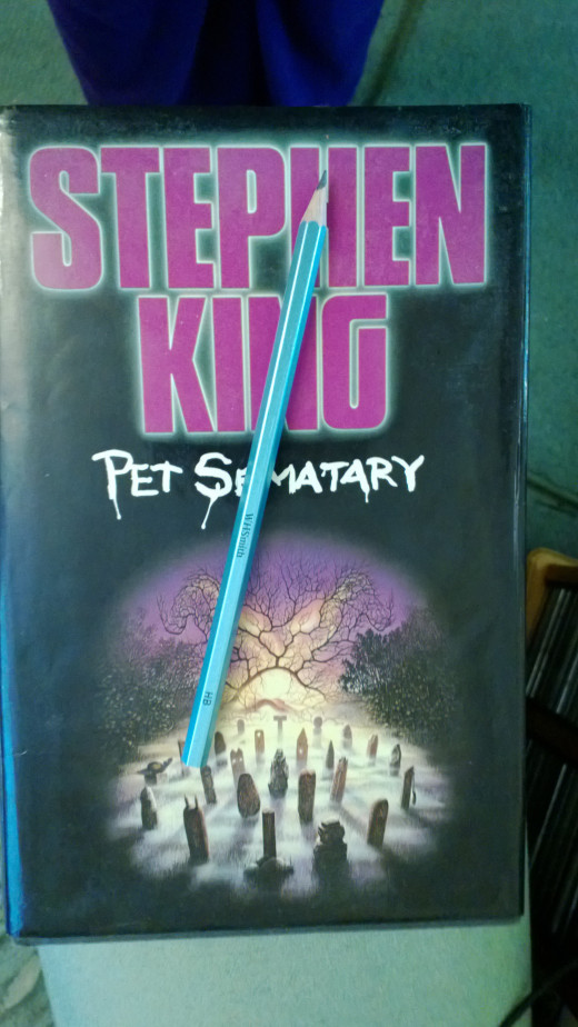 An old copy of Pet Cemetery, and a pencil