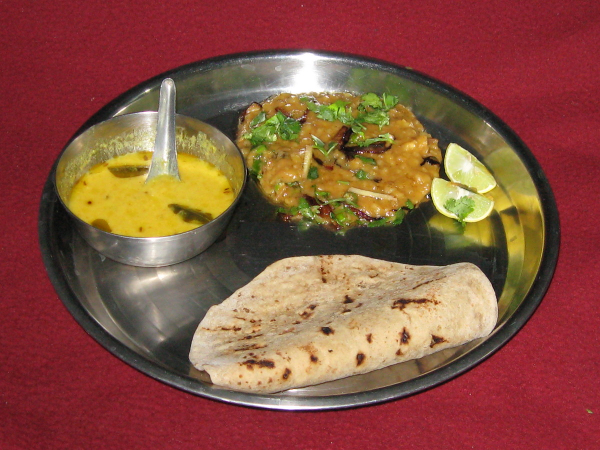 Relish this Khichda meal .... roti, khichda, karhi, lime
