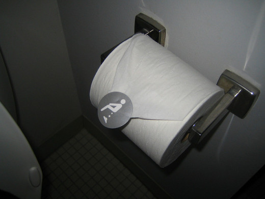 Toilet paper with clever poop sticker on it