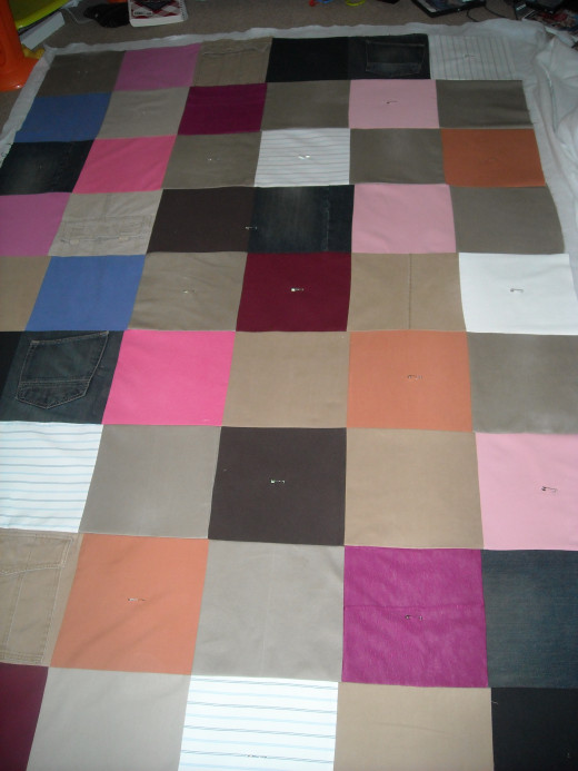 An Upcycled Quilt How to Make a Quilt Using Shirts, Pants, and a Sheet