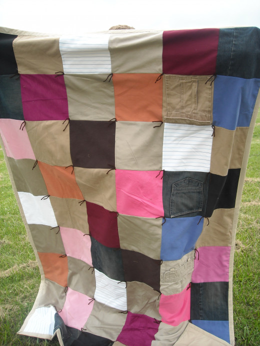 An Upcycled Quilt How to Make a Quilt Using Shirts, Pants, and a Sheet